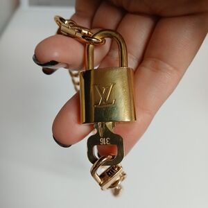 Louis Vuitton Padlock Lock & Key comes w/18in unbranded Gold Chain  316